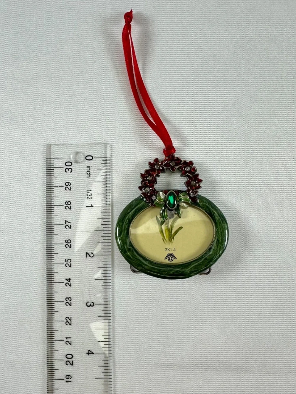 Enamel Red Poinsettia Wreath Christmas Ornament With Green Stone on Bow Frame